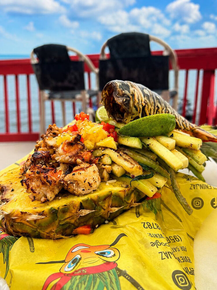 Lobster Ninja Bowl served in a hand-carved pineapple